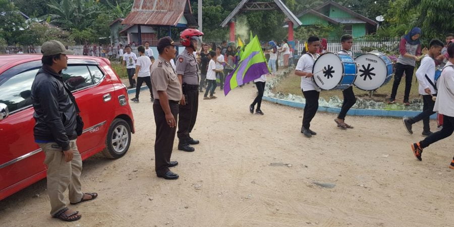 Waka Polsek Lage Bersama Anggota Amankan Kegiatan Reuni SMPN 2 Lage